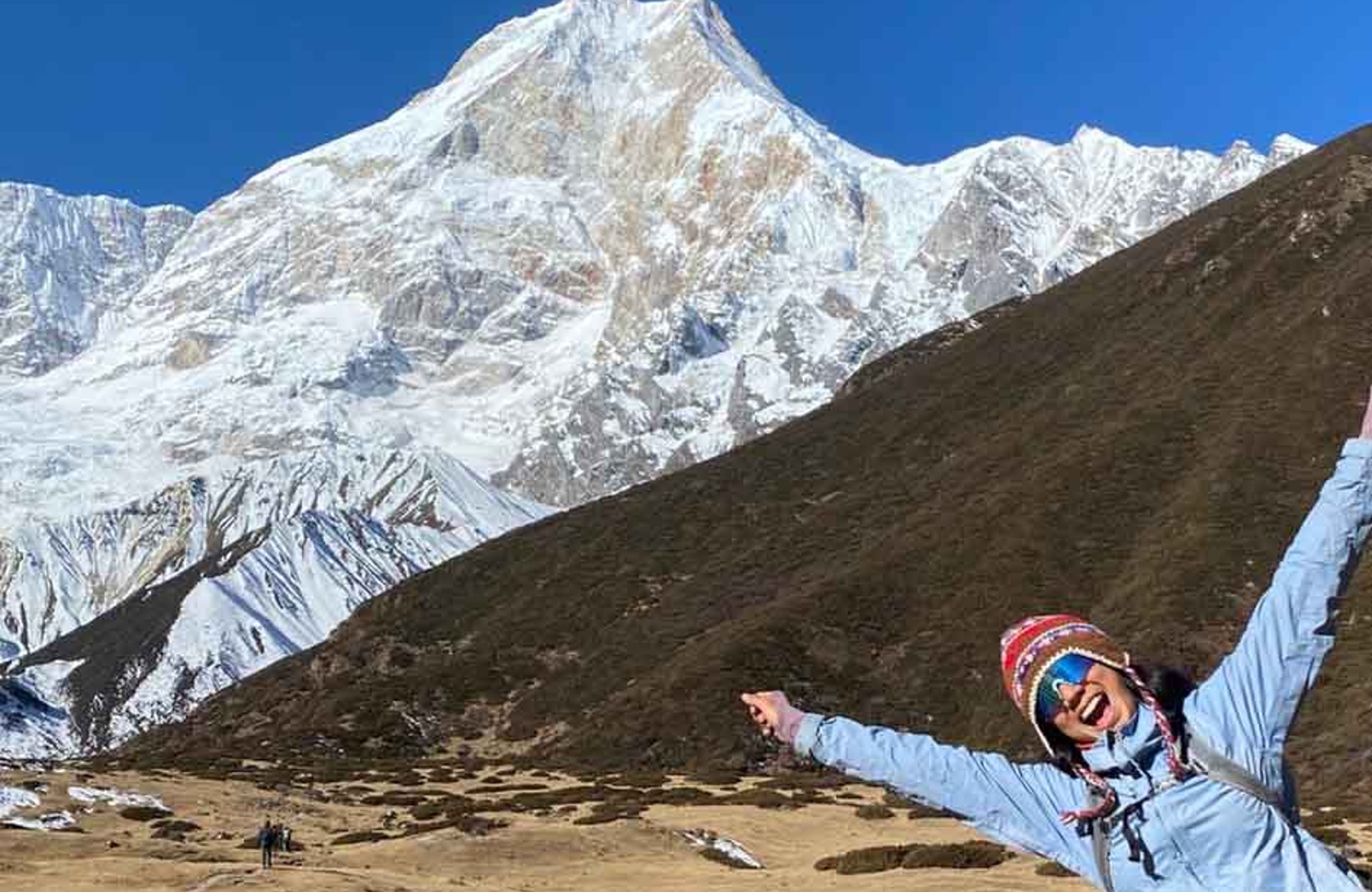 View from Pungen Gompa monastery with snow-capped Mount Manaslu rising behind in the Himalayas.